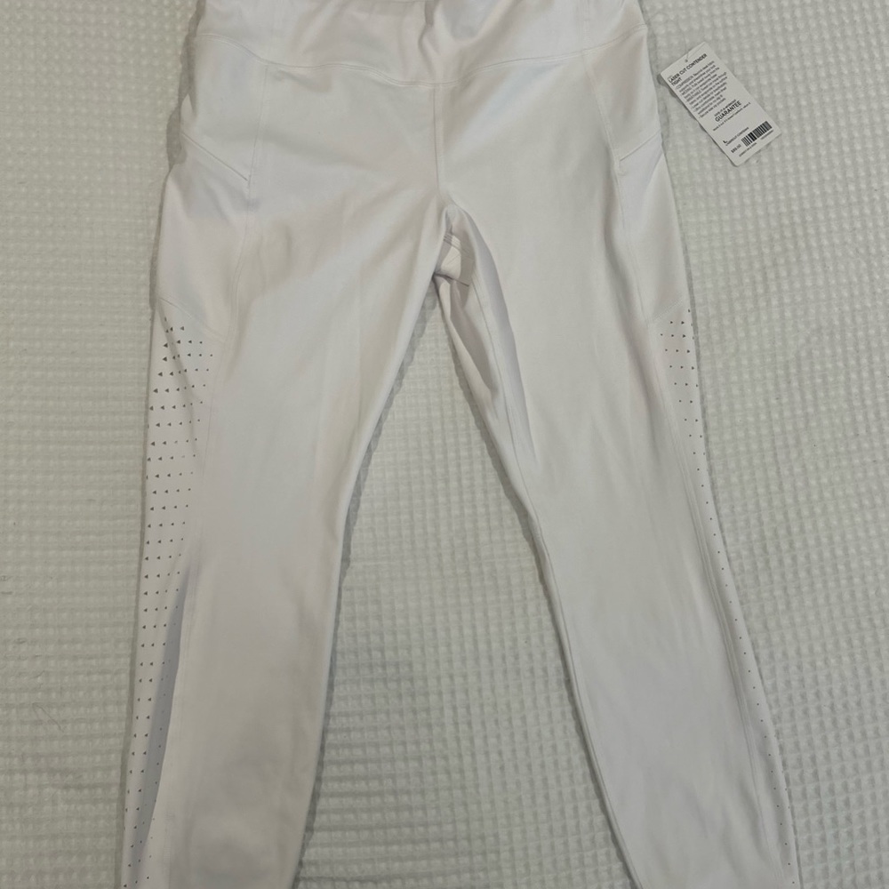 White laser cut Athleta a full length leggings NWT sz large.